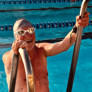 Masters Swimmer leaving a swim coach session in the pool